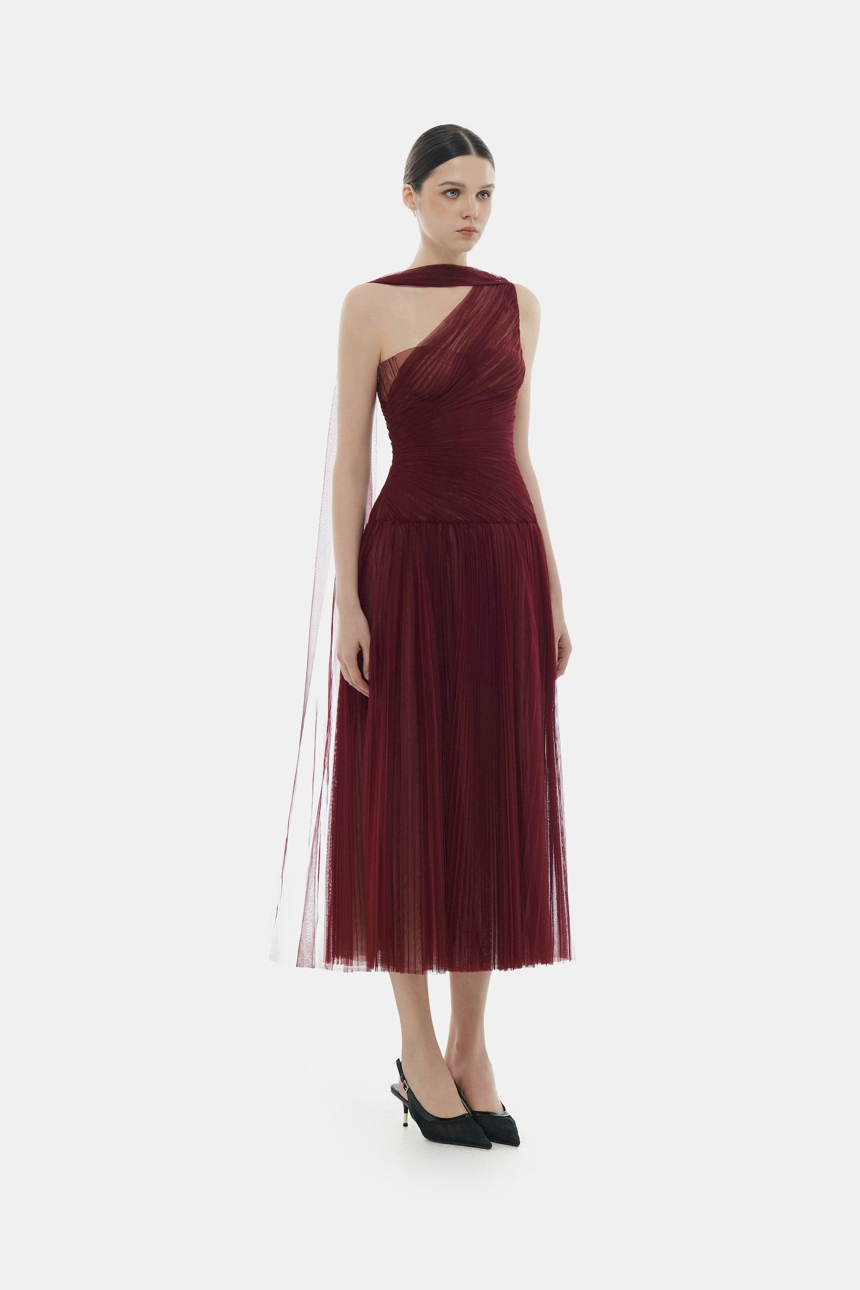 Woman in burgundy cocktail dress